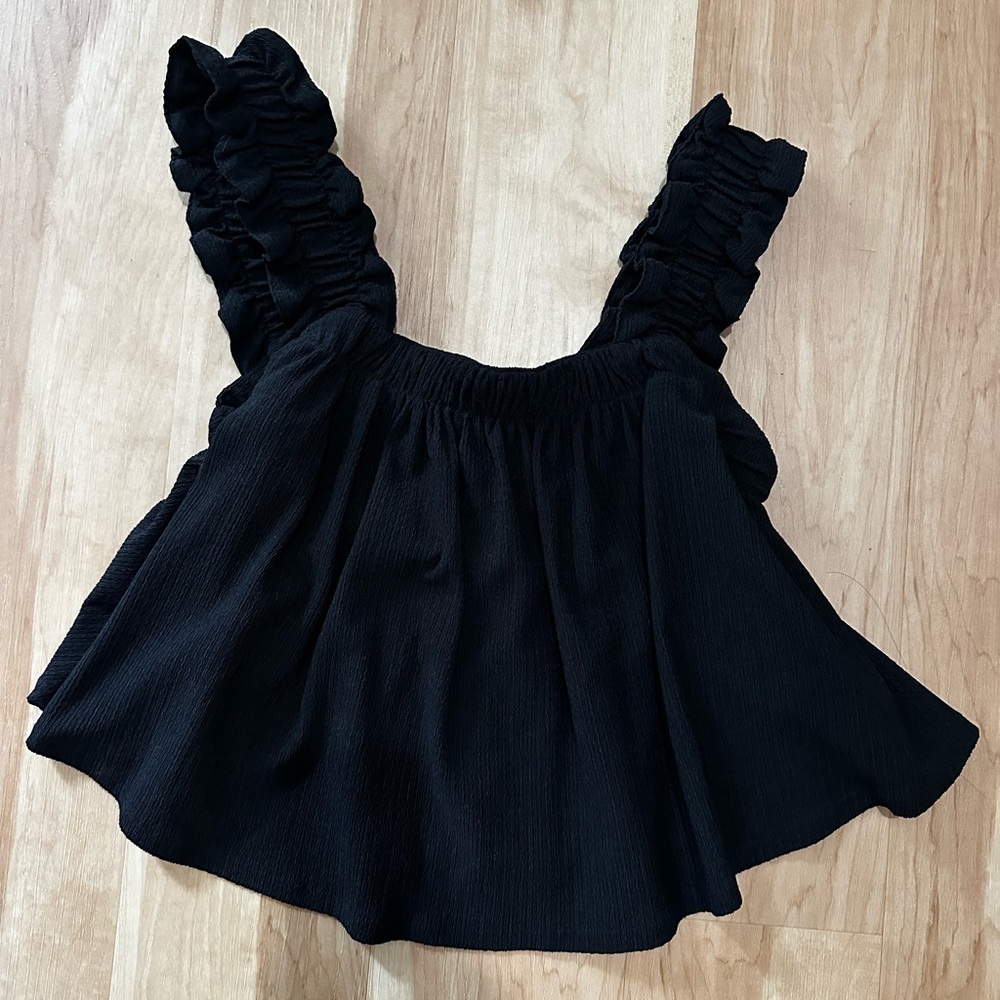 Black ruffle top